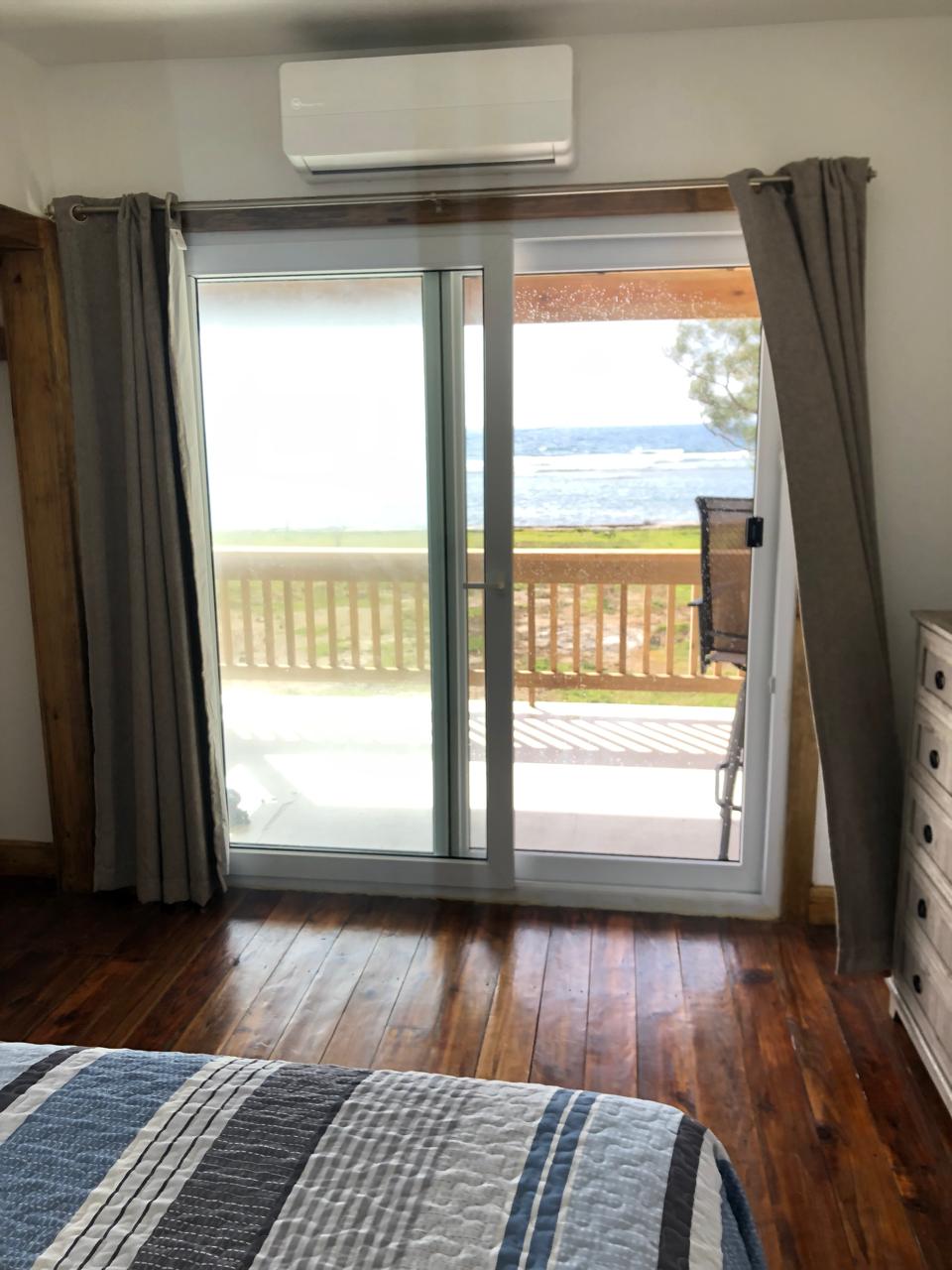 Bedroom and interior details at the Roatan fishing lodge